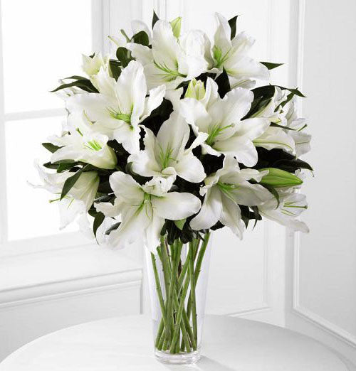 Light in your Honor funeral flower arrangement of all white flowers Medium