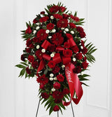 Red and white funeral flower standing spray with red bow Large