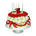 Floral birthday cake on stand with candles