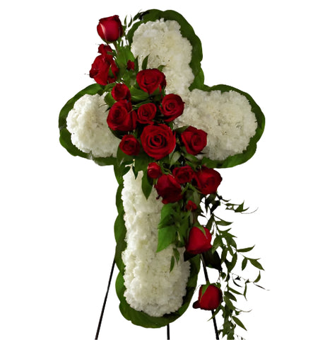 Funeral flower cross on stand with white carnations and red roses