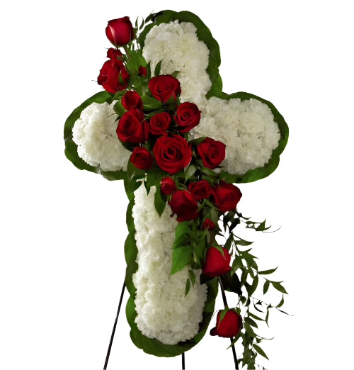 Funeral flower cross on stand with white carnations and red roses